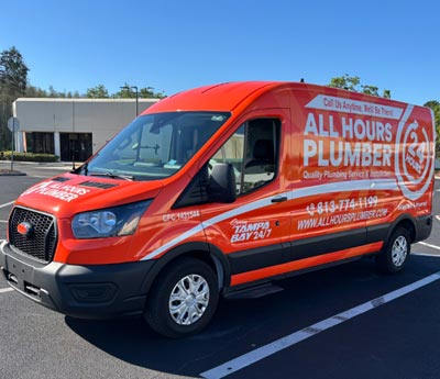 All Hours Plumber Service Van in a Parking Lot in Clearwater, FL