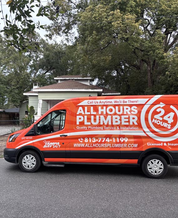 All Hours Plumber service van in front of a historic bungalow home in Seminole Heights