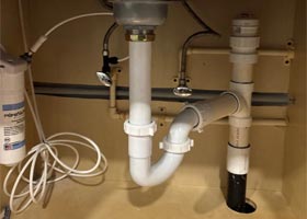 Kitchen sink tubular drain pipe repairs and point of use water filtration installation near Belcher Road in the Somerset Lakes area of Largo.